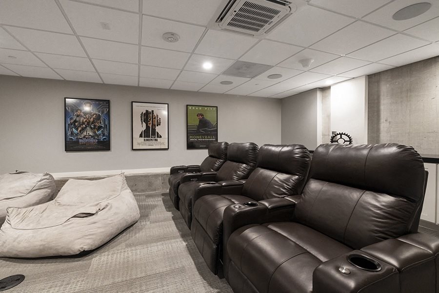 Media room with seating and bing bag chairs Rasa Oakland Apartments for rent